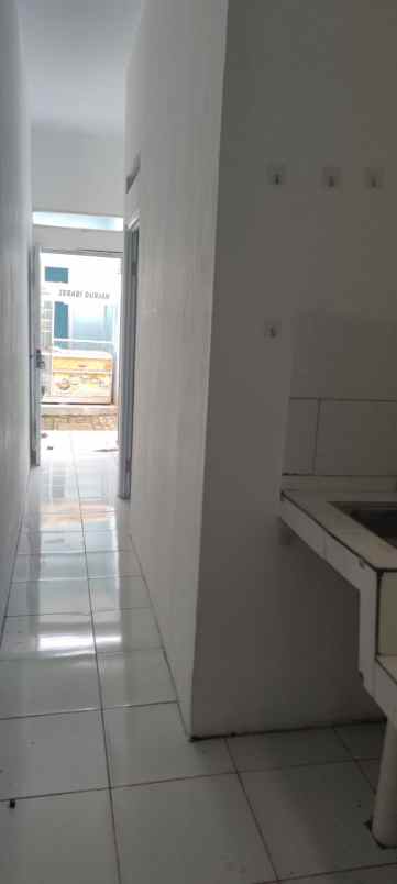 rumah kontrakan 8 pintu