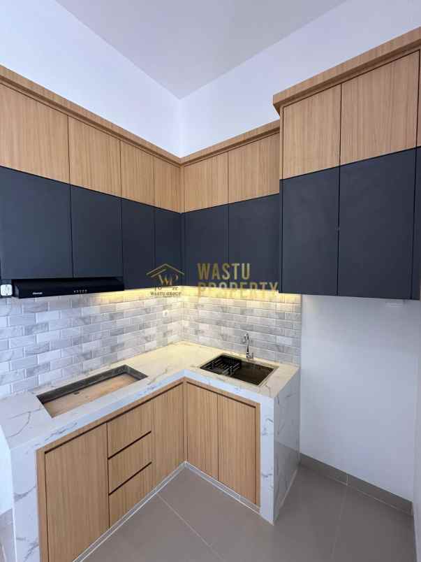 rumah modern dalam cluster di mlati sleman