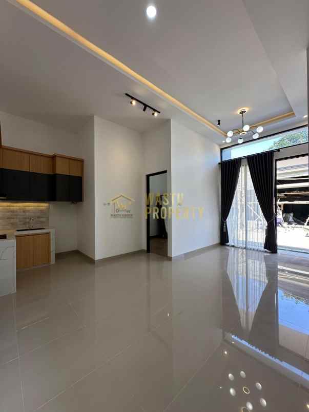 rumah modern dalam cluster di mlati sleman