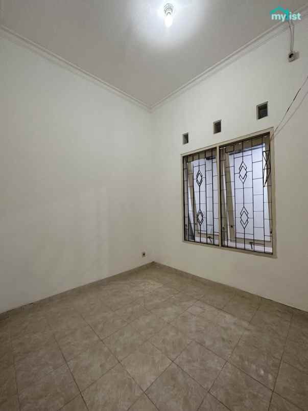 rumah siap huni dalam cluster purimas kosongan terawat