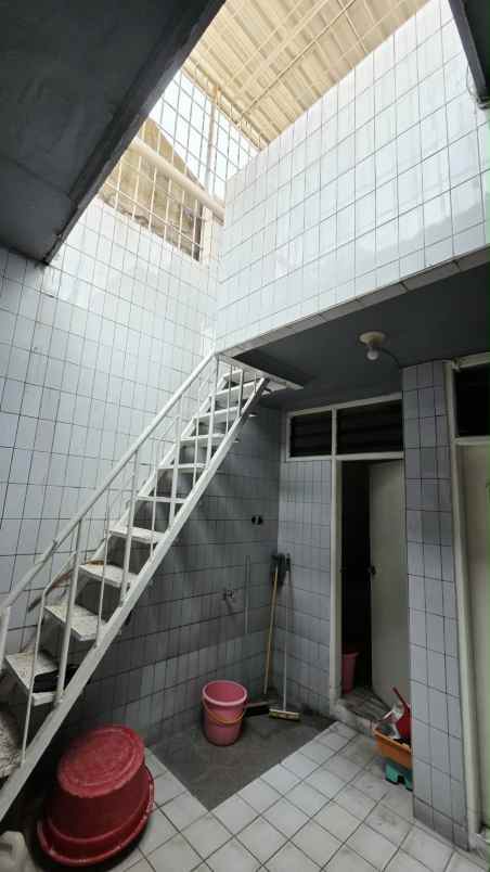 dijual rumah dharmahusada indah