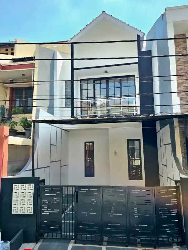 dijual rumah jl raya pondok kelapa