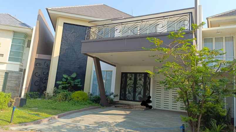 dijual rumah pakuwon city