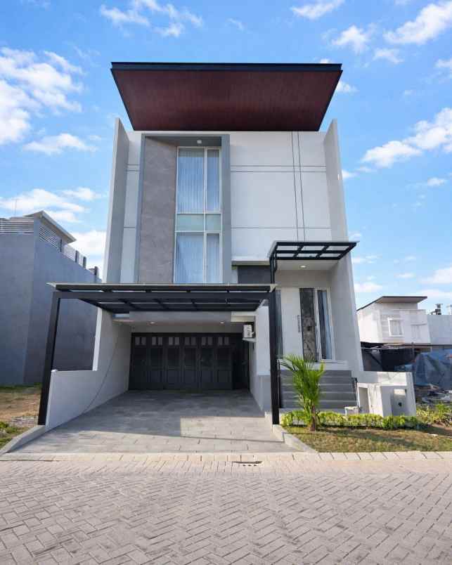 dijual rumah suvadiva grand island pakuwon city