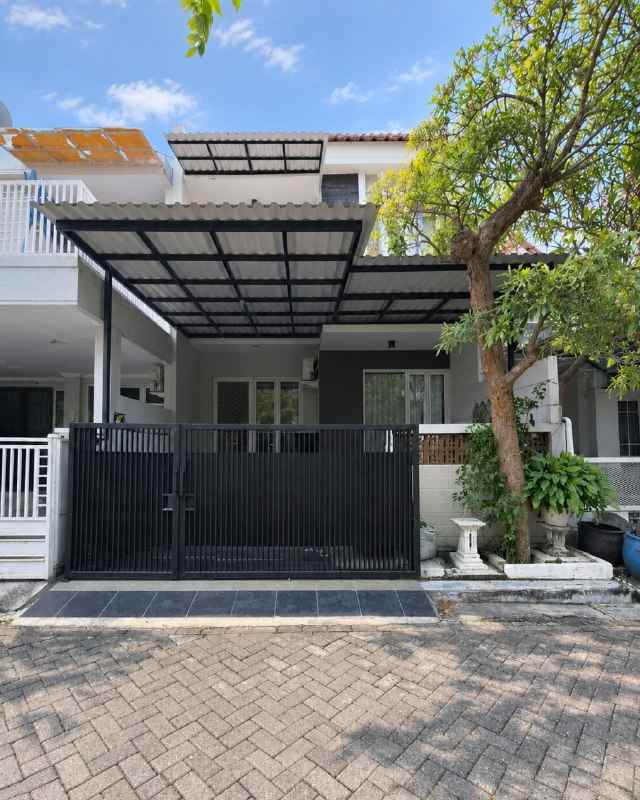 dijual rumah taman mutiara pakuwon city