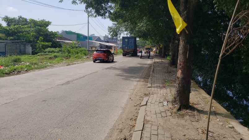 dijual tanah jl raya kampung melayu