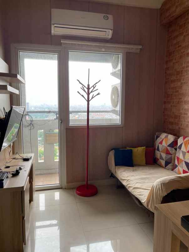 disewakan apartemen green pramuka city tower scarlet