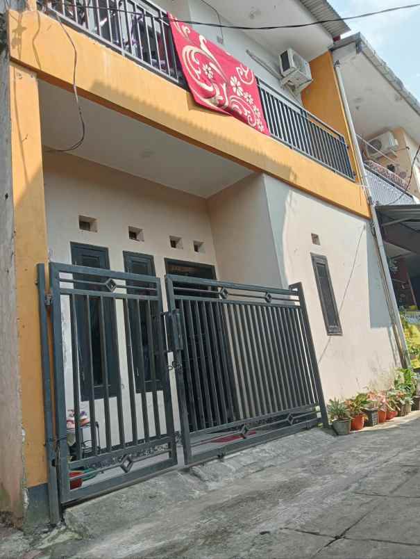 rumah 2 lantai murah 200 juta nego