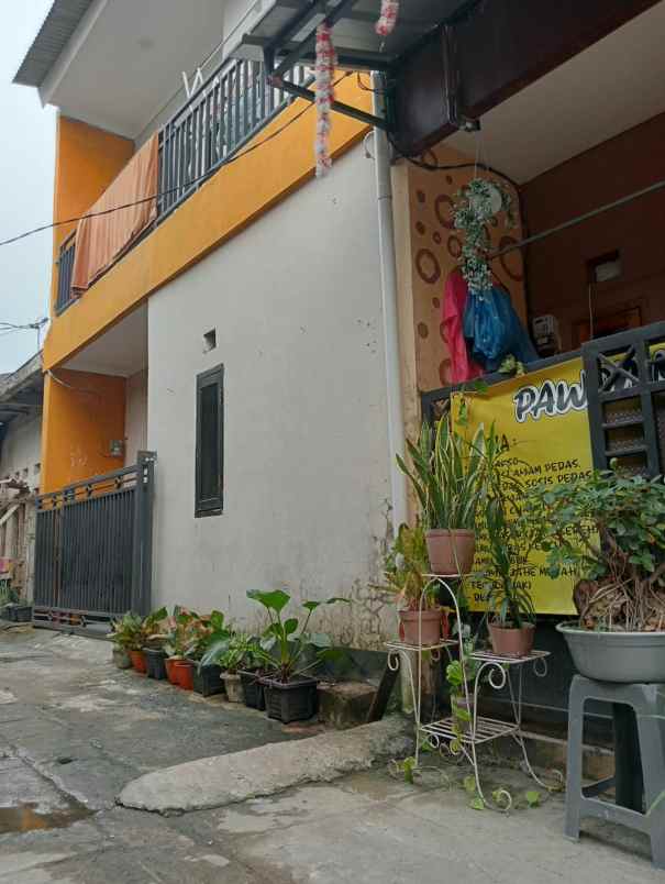 rumah 2 lantai murah 200 juta nego
