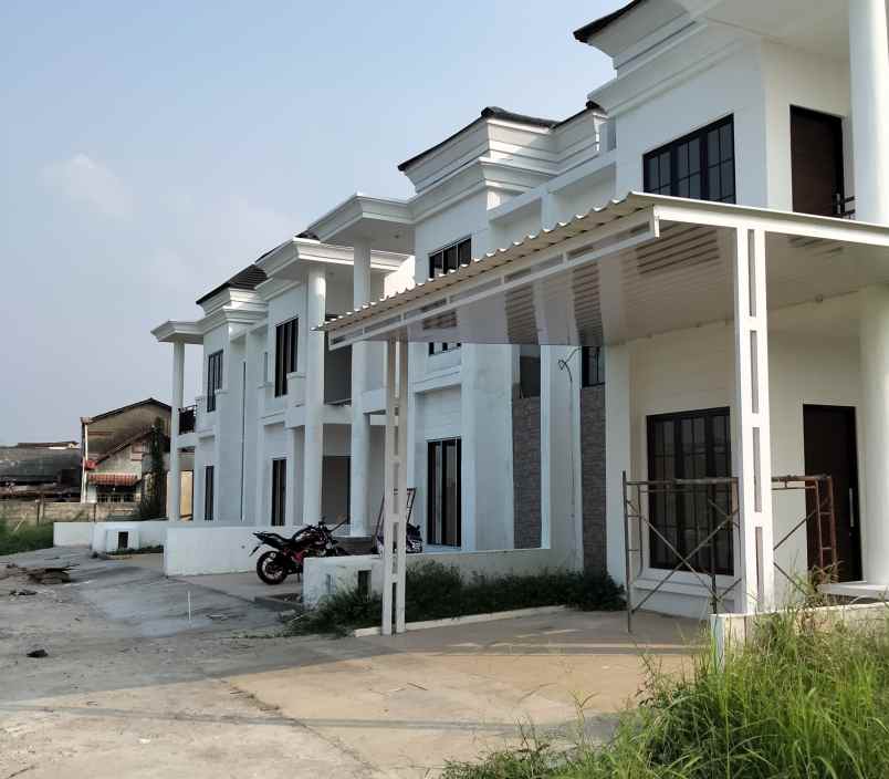 rumah jl raya kota harapan