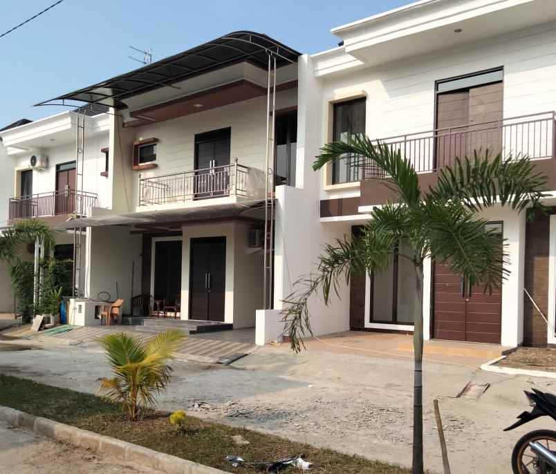 rumah jl raya kota harapan