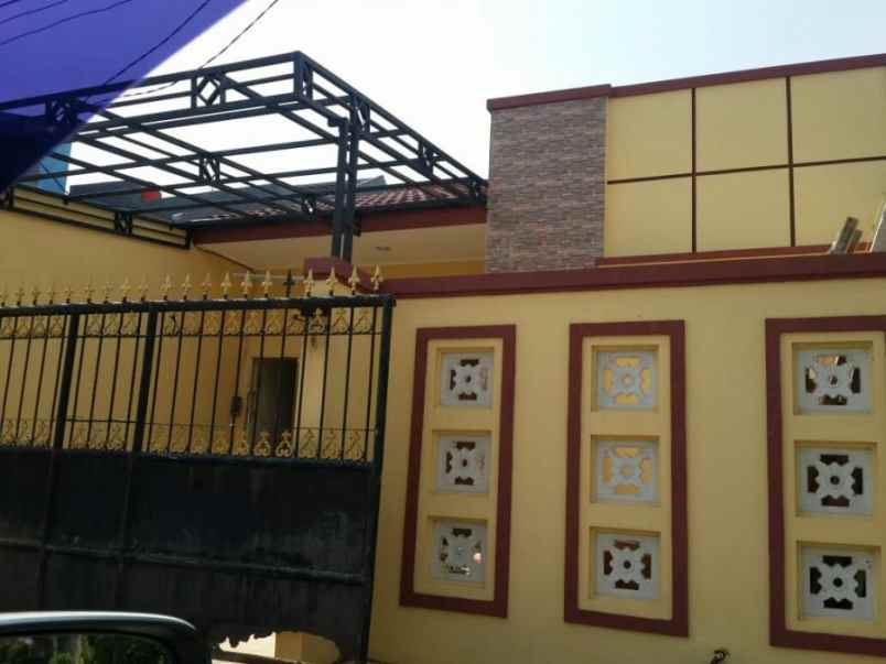 rumah jl salak kota harapan indah