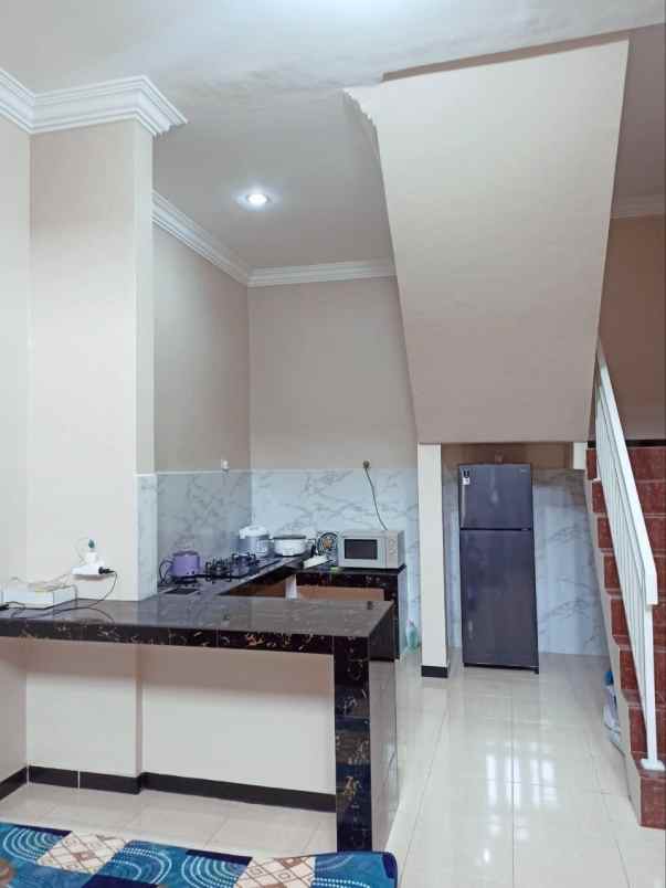 rumah pakuwon city minimalis siap huni strategis