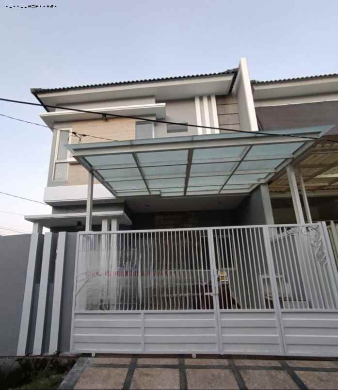 rumah sutorejo tengah minimalis strategis