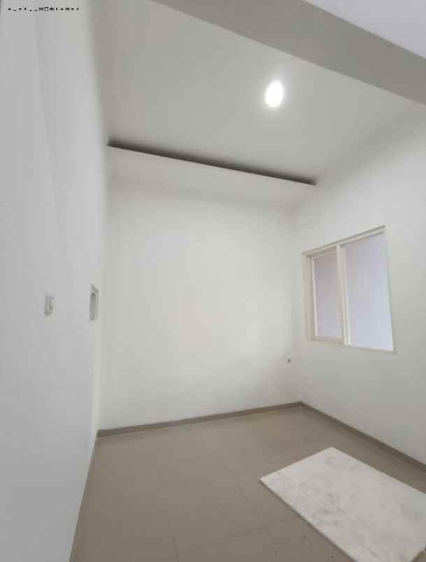 rumah sutorejo tengah minimalis strategis