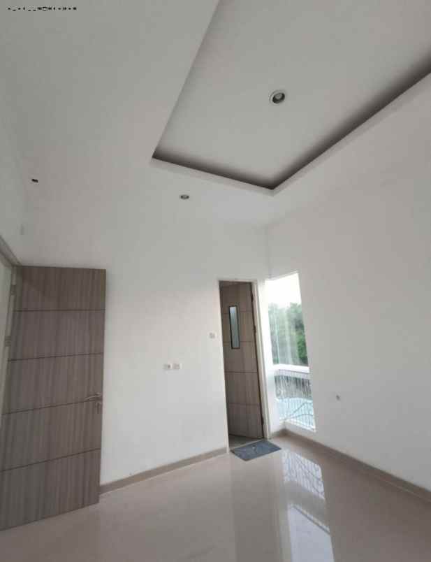 rumah sutorejo tengah minimalis strategis