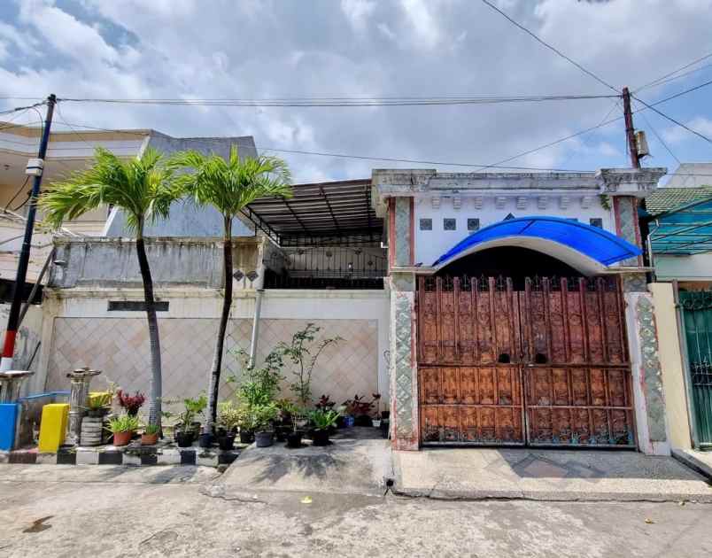 dijual rumah babatan pantai