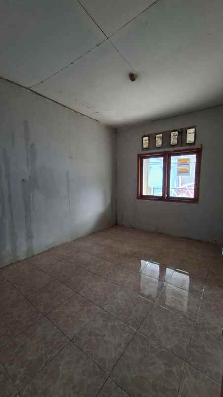 dijual rumah bumi sawangan indah