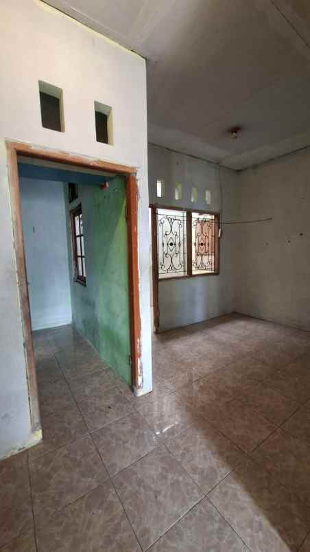 dijual rumah bumi sawangan indah