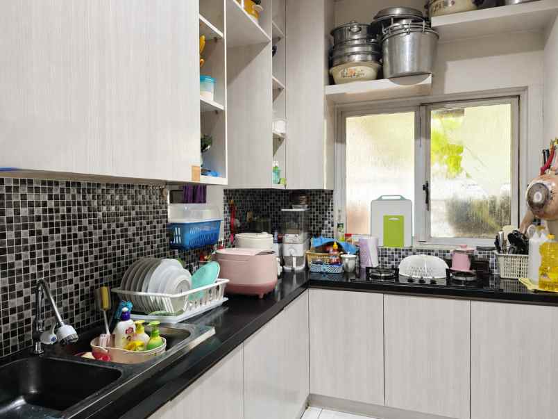 dijual rumah cluster palm spring jgc