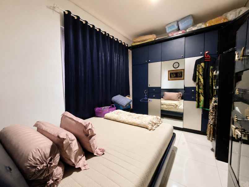 dijual rumah cluster palm spring jgc