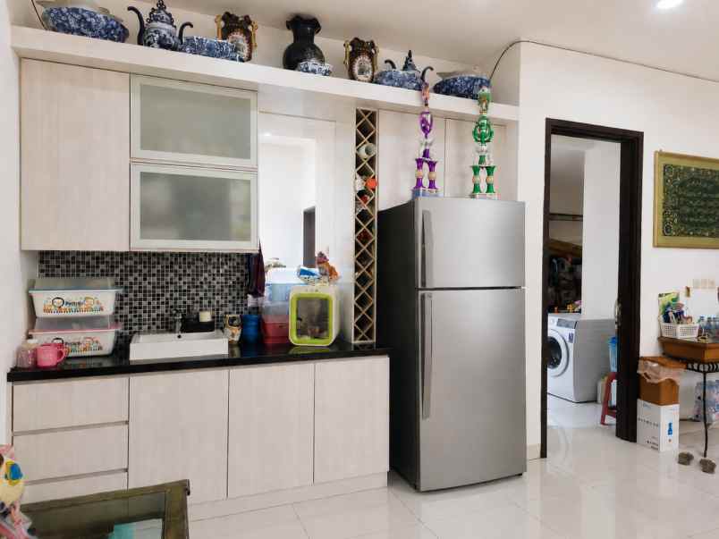 dijual rumah cluster palm spring jgc
