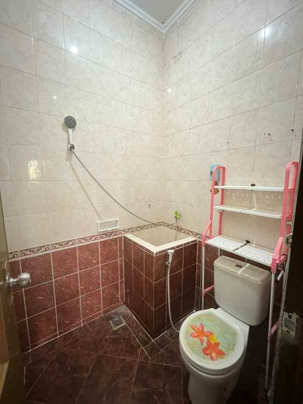 dijual rumah cluster taman sari kota