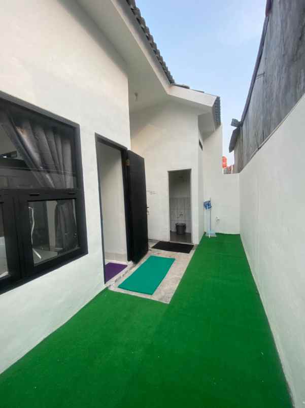 dijual rumah jalan raya megu cisoka