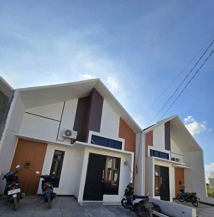 dijual rumah pinggir jalan raya