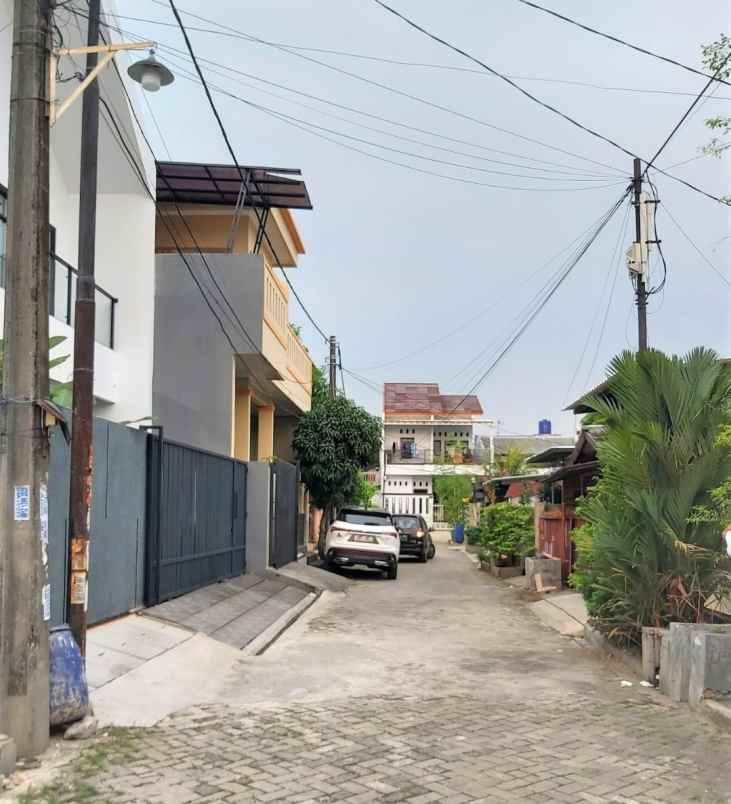 dijual tanah harapan indah 1 perumahan