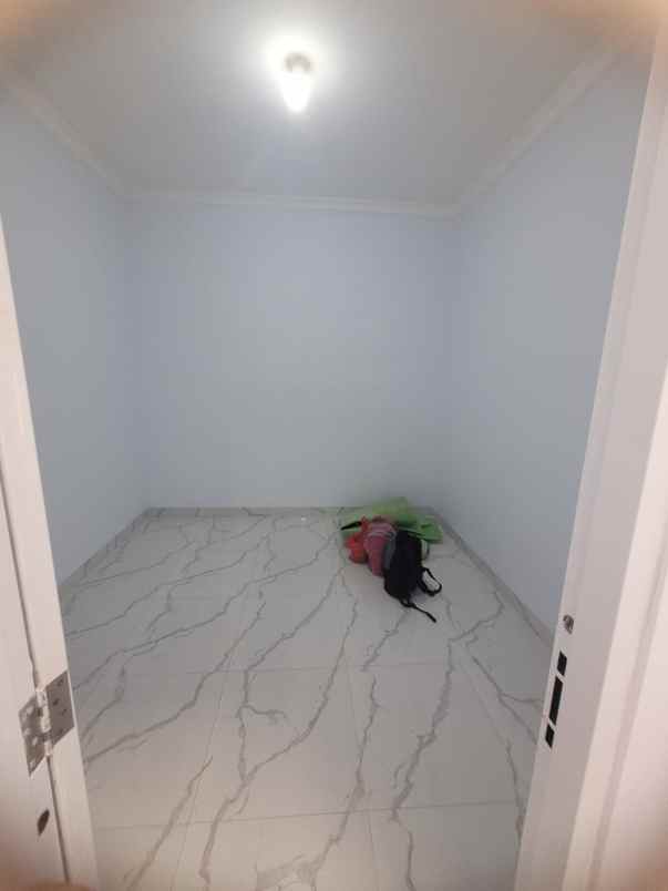 disewakan rumah jl melati kelapa dua wetan