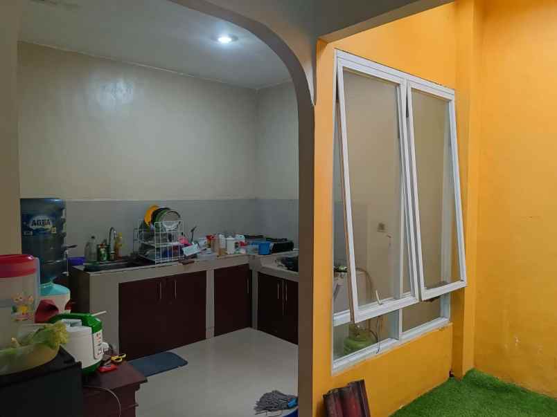 rumah dalam perumahan sawangan permai depok