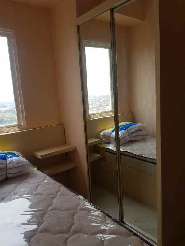 apartemen puncak dharmahusada tower b lantai 16