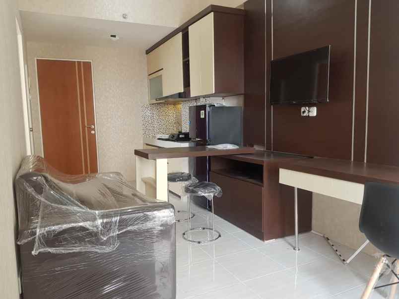 apartemen puncak dharmahusada tower b lantai 16
