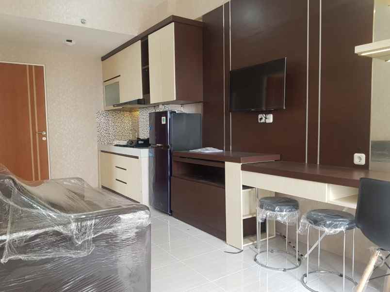 apartemen puncak dharmahusada tower b lantai 16