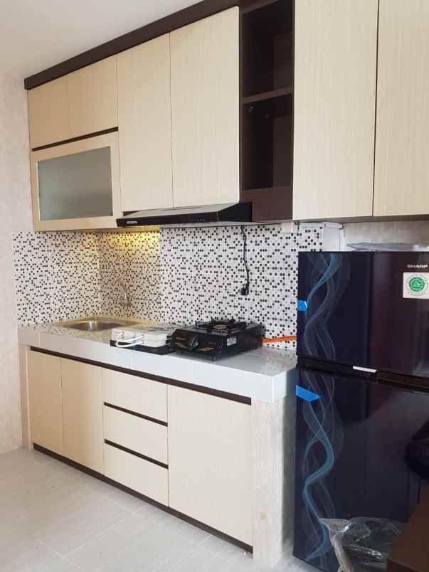 apartemen puncak dharmahusada tower b lantai 16
