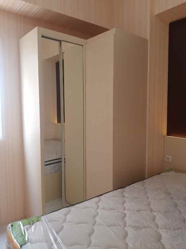 apartemen puncak dharmahusada tower b lantai 16
