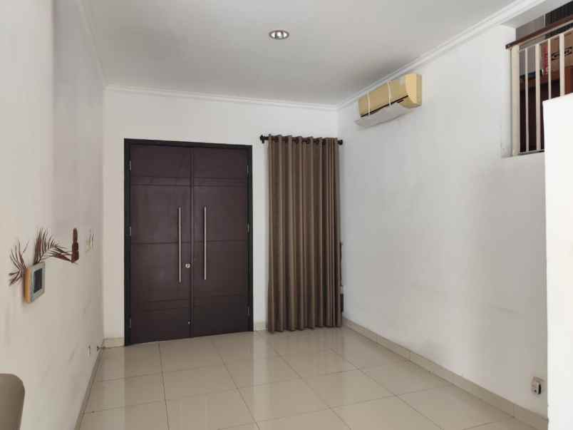 dijual rumah cluster palm spring jgc