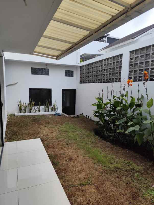 dijual rumah cluster palm spring jgc