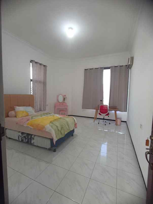 dijual rumah dharmahusada indah