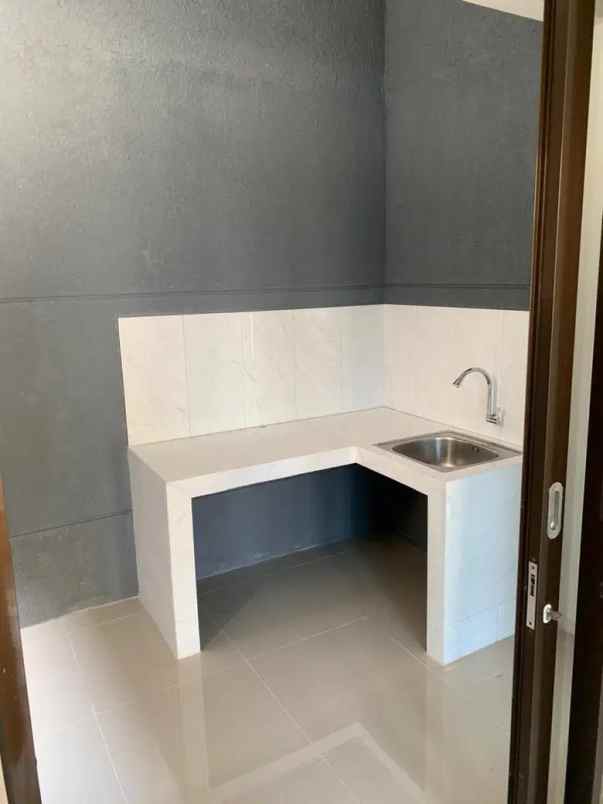 dijual rumah graha raya fortune