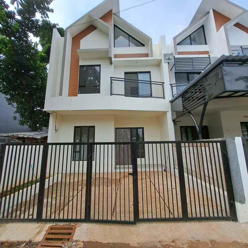 dijual rumah jalan raya parpostel