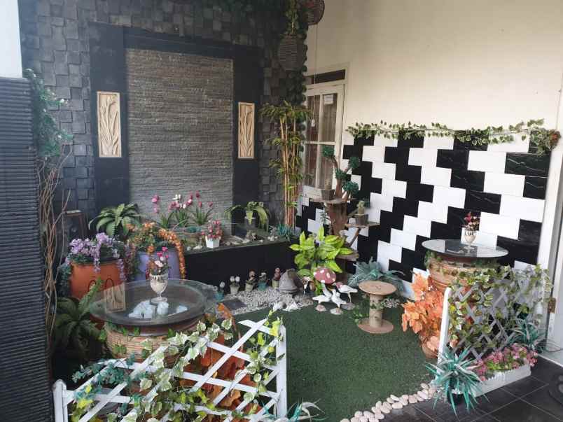 dijual rumah jalan titan asri