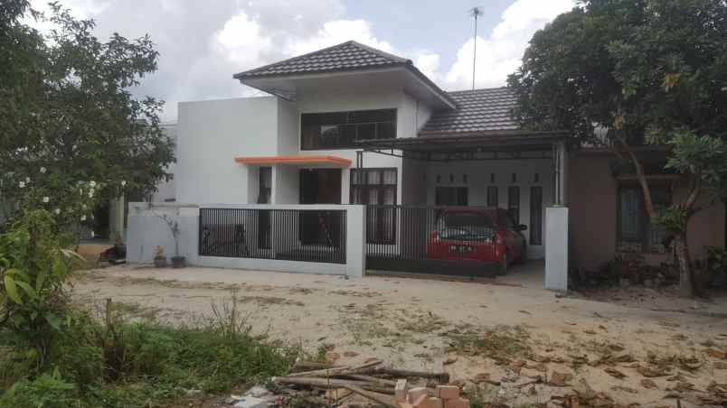 dijual rumah jl bunga inem