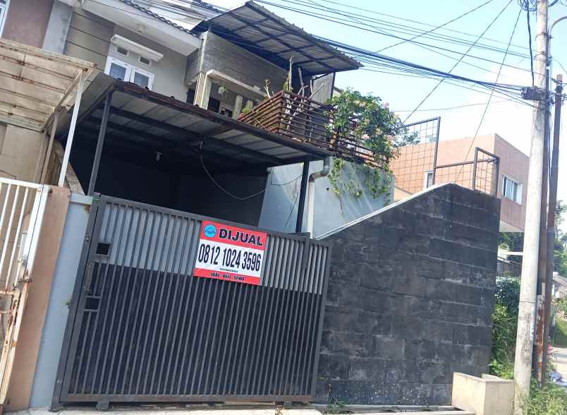 dijual rumah komplek sariwangi