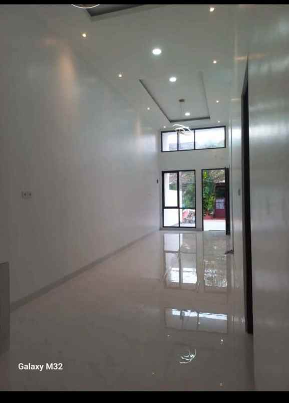 dijual rumah taman harapan baru