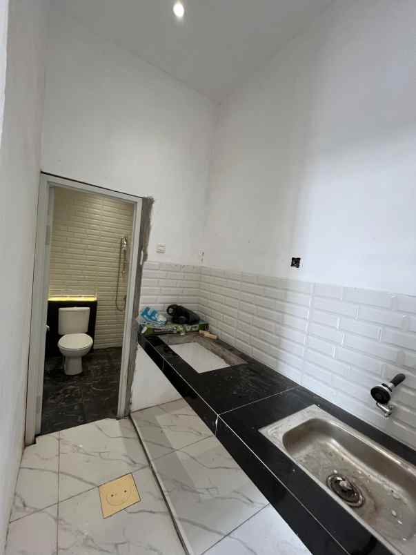 rumah cash kredit batas kota surabaya barat