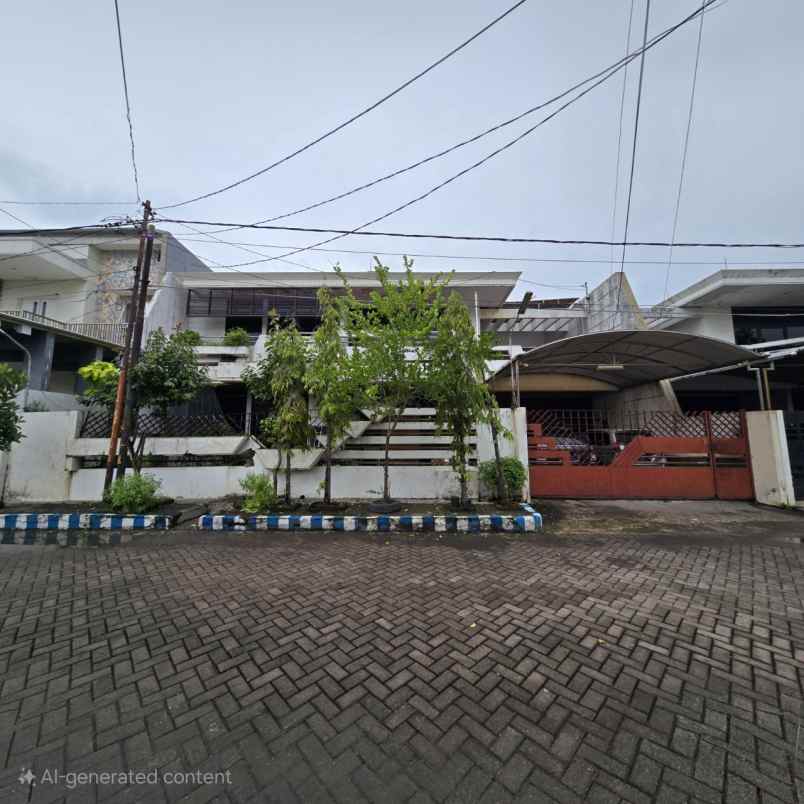 rumah dharmahusada indah strategis row 3 mobil
