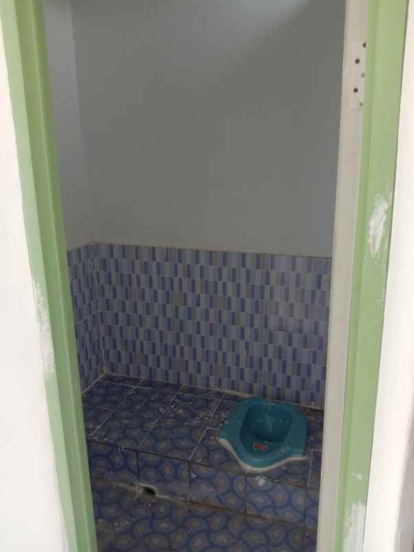 rumah jalan raya srimahi tambun