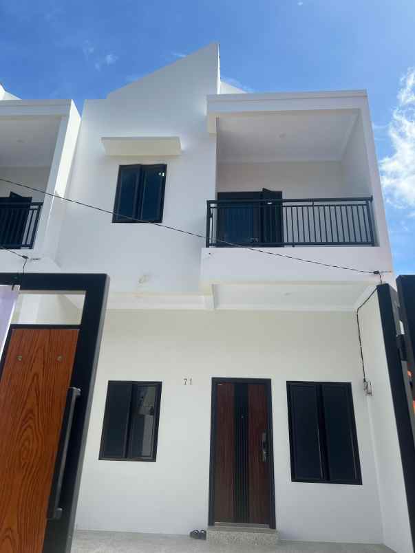 rumah jl komplek timah depok